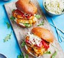 15-minute chicken & halloumi burgers served on a wooden serving platter