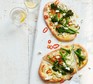 Broccoli & goat’s cheese pizzettes served on a board