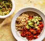 One serving of spicy red lentil chilli with guacamole & rice