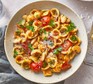 A serving of orecchiette with butter beans, parsley, chilli and lemon in a bowl