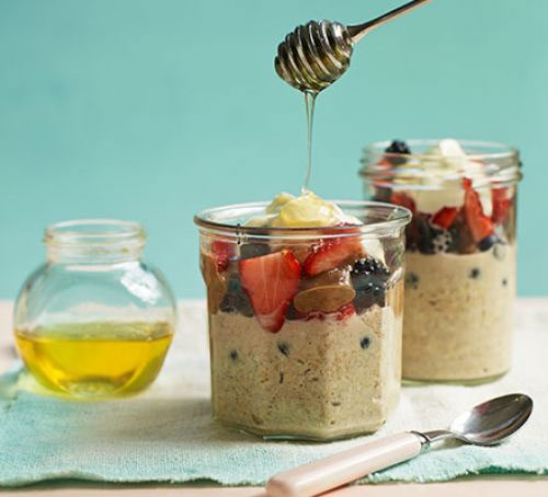 Two jars of overnight oats with honey