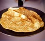 golden pancake in a frying pan