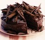 Ultimate chocolate cake topped with chocolate curls
