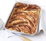 Golden baked toad-in-the-hole in large rectangular dish