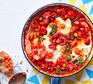 Saucy bean baked eggs in a pan