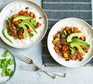 Vegan chilli served in bowls with white rice